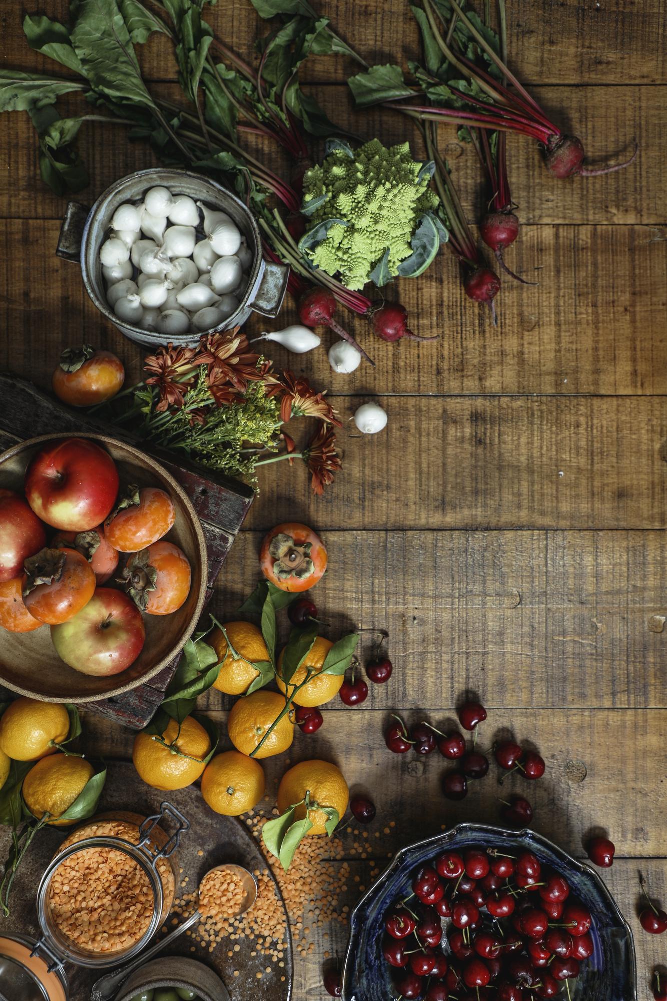 Arrangement of seasonal ingredients on a wooden table